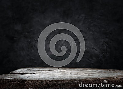 Empty wood table top counter on dark wall background.For create product display or design key visual Stock Photo