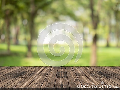 Empty wood table top on nature green blurred background at garden,space for montage show product Stock Photo