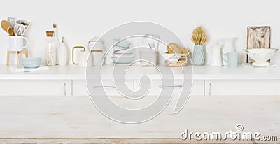 Empty wooden board with copyspace on defocused kitchen counter background Stock Photo