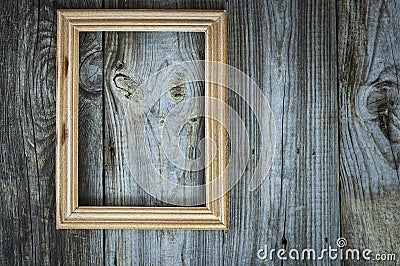 Empty wooden frame on aged gray wooden wall Stock Photo