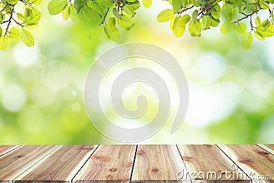 Empty wooden table with blurred city park on background. Stock Photo