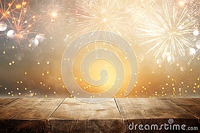 Empty wooden table in front of fireworks background. Product display montage. Stock Photo