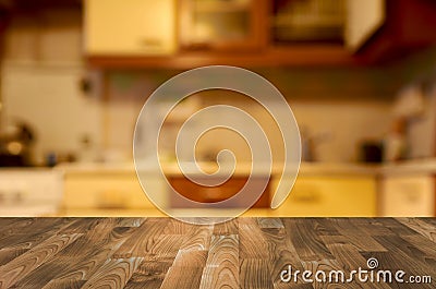 Empty wooden table with kitchen bokeh Stock Photo