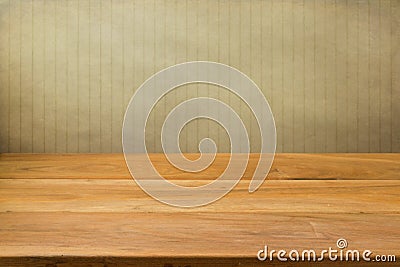 Empty wooden table over grunge striped background. Stock Photo