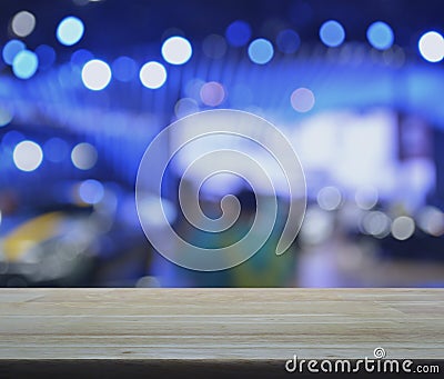 Empty wooden table over shopping mall Stock Photo