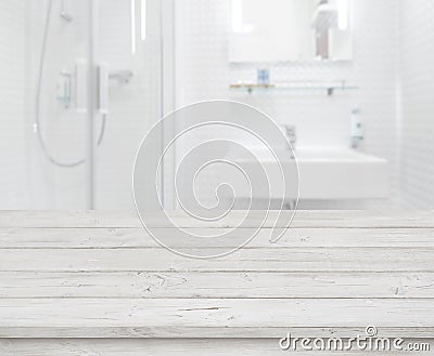 Empty wooden table for product display on blurred bathroom interior Stock Photo