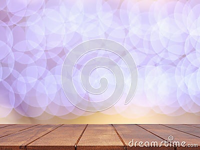 Empty wooden table top with abstract blurred lighting background Stock Photo