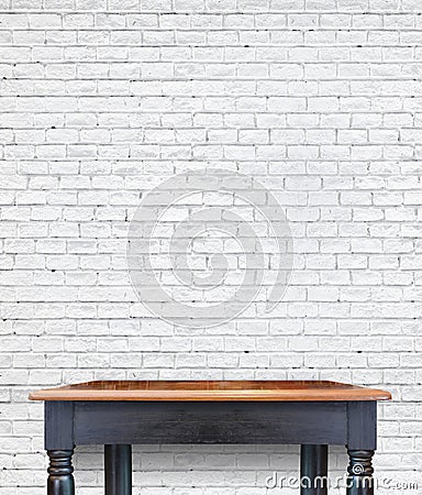 Empty wooden vintage table on brick tiles wall,Mock up for display of product Stock Photo