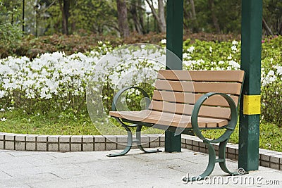 Empy bench in green park Stock Photo