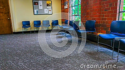 Empy office waiting room in vintage brick building Stock Photo