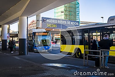 EMT and Airport bus outside Atocha railway station Editorial Stock Photo
