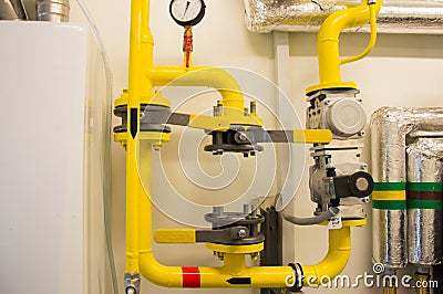 Emty space among the yellow gas pipes for natural gas meter installation Stock Photo