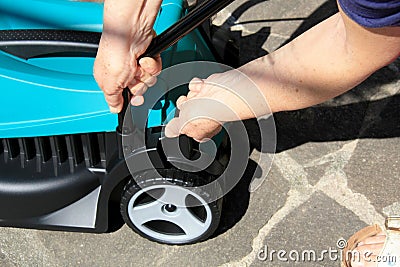 Enabling a mow for cutting down a lawn Stock Photo