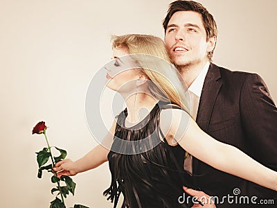 Enamoured couple in titanic gesture. Stock Photo