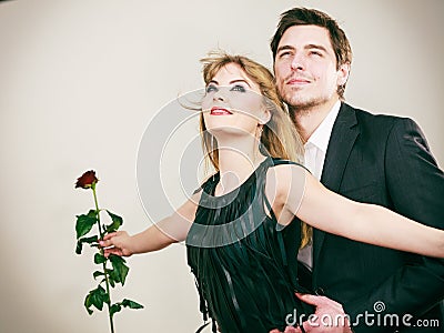 Enamoured couple in titanic gesture. Stock Photo