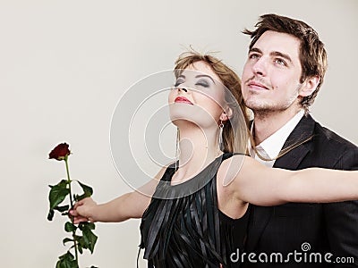 Enamoured couple in titanic gesture. Stock Photo