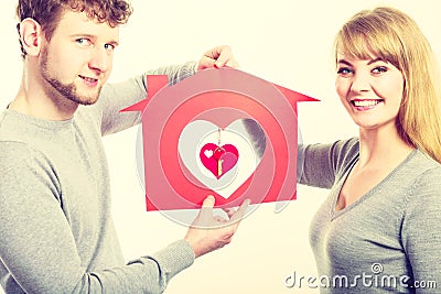 Enamoured young marriage with house and keys. Stock Photo