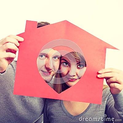 Enamoured young marriage with house. Stock Photo