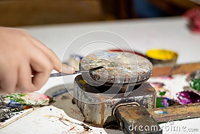 Encaustic painting, also known as hot wax painting Stock Photo