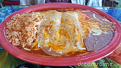 Tamale and enchilada combo Stock Photo