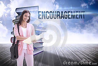 Encouragement against stack of books against sky Stock Photo