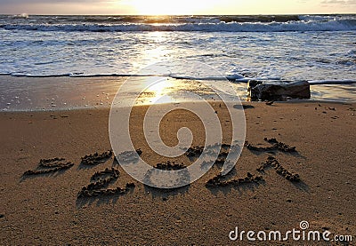 New Year 2021 is coming, message see you 2021 on a beach sand, Summer beach holiday 2020 season is over, copy space Stock Photo