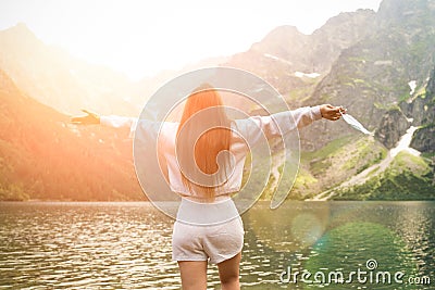 End covid. Young female person remove protective, happy woman take off medical mask. Covid-19. happy time, fresh air Stock Photo