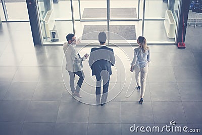 End of day job. Business people leave the office. Space for copy Stock Photo