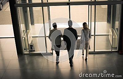End of day job. Business people leave the office. Space for copy Stock Photo