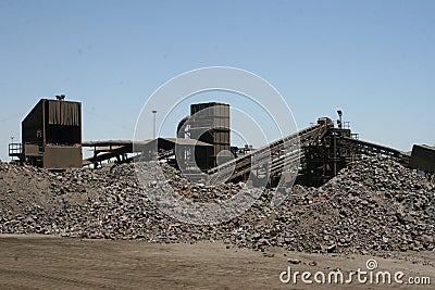 End game â€“ Heaps of silicomanganese alloy at metal treatment plant Stock Photo