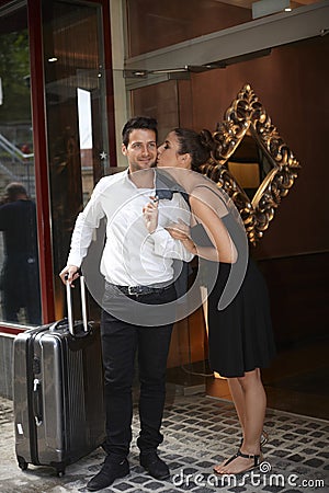 http://thumbs.dreamstime.com/x/end-holiday-loving-couple-leaving-hotel-women-kissing-man-having-suitcase-38603373.jpg