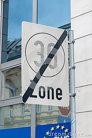 End of a 30 km per h zone road sign Stock Photo