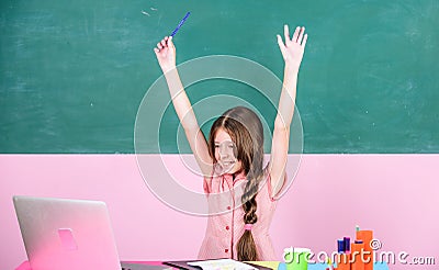 End of lesson. Online education. Working on project. smart school girl in classroom. back to school. small girl pupil Stock Photo
