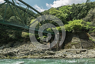 End of train bridge along Hozugawa River. Stock Photo