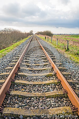 Almost endless straight rail track Stock Photo