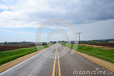 Endless straight road in Iowa, United States Stock Photo