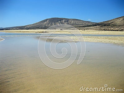 Endless wide tideland in the lagoon of Gorriones, Playa de Sotavento, Costa calma, Fuerteventura, Spain Stock Photo