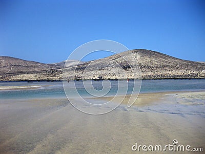 Endless wide tideland in the lagoon of Gorriones, Playa de Sotavento, Costa calma, Fuerteventura, Spain Stock Photo