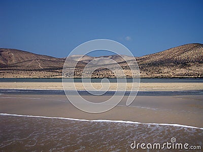 Endless wide tideland in the lagoon of Gorriones, Playa de Sotavento, Costa calma, Fuerteventura, Spain Stock Photo