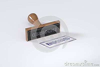 Rubber stamping that says Endorsed on White Background Stock Photo