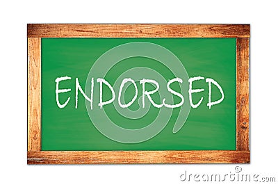 ENDORSED text written on green school board Stock Photo