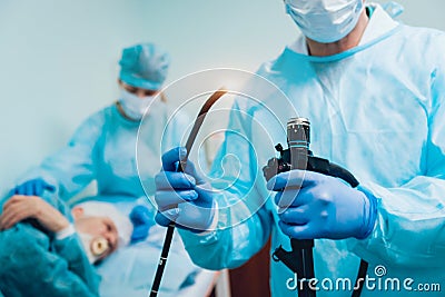 Endoscopy at the hospital. Doctor holding endoscope before gastroscopy Stock Photo