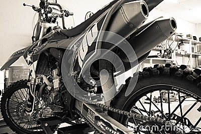 Enduro off-road motorcycle close-up in the garage Editorial Stock Photo