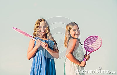 Energetic children. happy and cheerful. sporty game playing. summer outdoor games. play tennis. childhood happiness and Stock Photo
