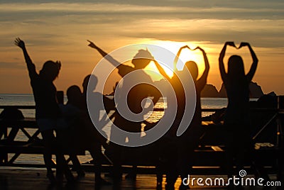 Energized youngster in front of the sunrise Stock Photo