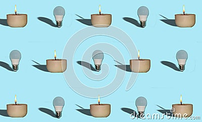 energy crisis, lack of electricity, light bulb and candle pattern, extinguished light bulb and lighted candle Stock Photo