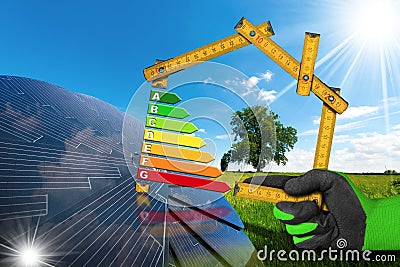 Energy Efficiency - House with Solar Panel Stock Photo