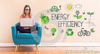 Energy Efficiency with young woman using her laptop Stock Photo