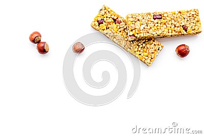 Energy protein snacks with hazelnuts on white background top view copy space Stock Photo