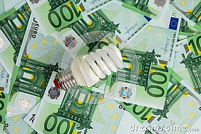 Energy saving light bulb on Euro Stock Photo